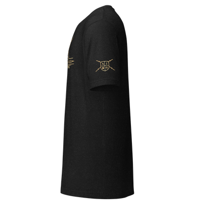 Black t-shirt with gold logo on sleeve against a white background